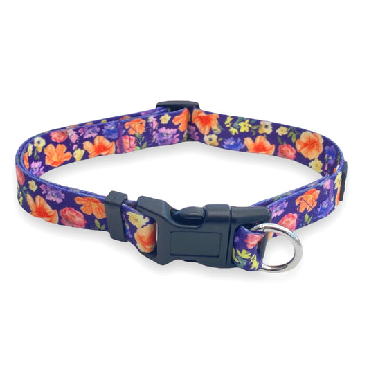 a photograph of a purple floral dog collar on a white background it is an escape proof collar