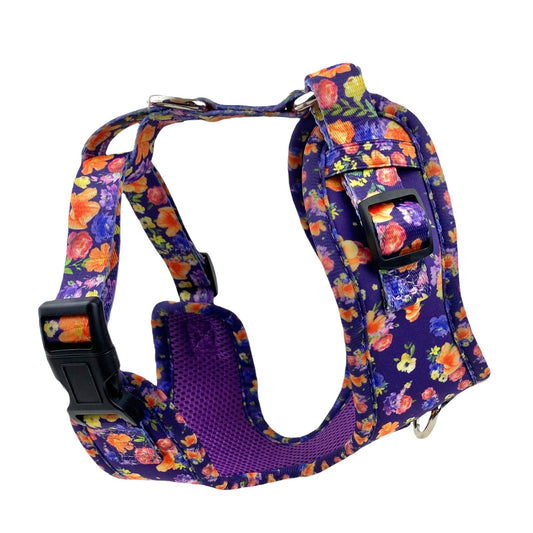 a 3D Image of a small padded dog harness in purple floral print by fearless pet also an escape proof dog harness for small dogs