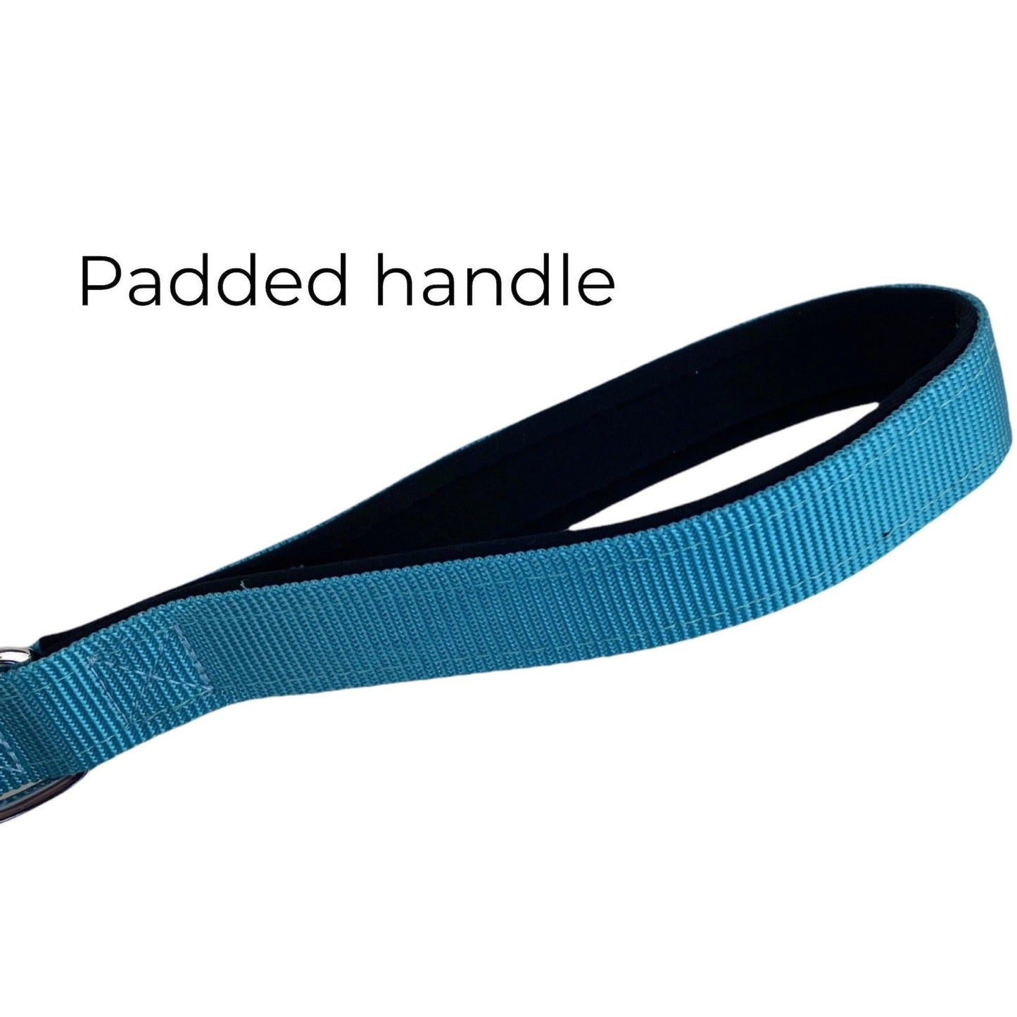 A close up photo of a teal blue leash handle that is padded - by fearless pet