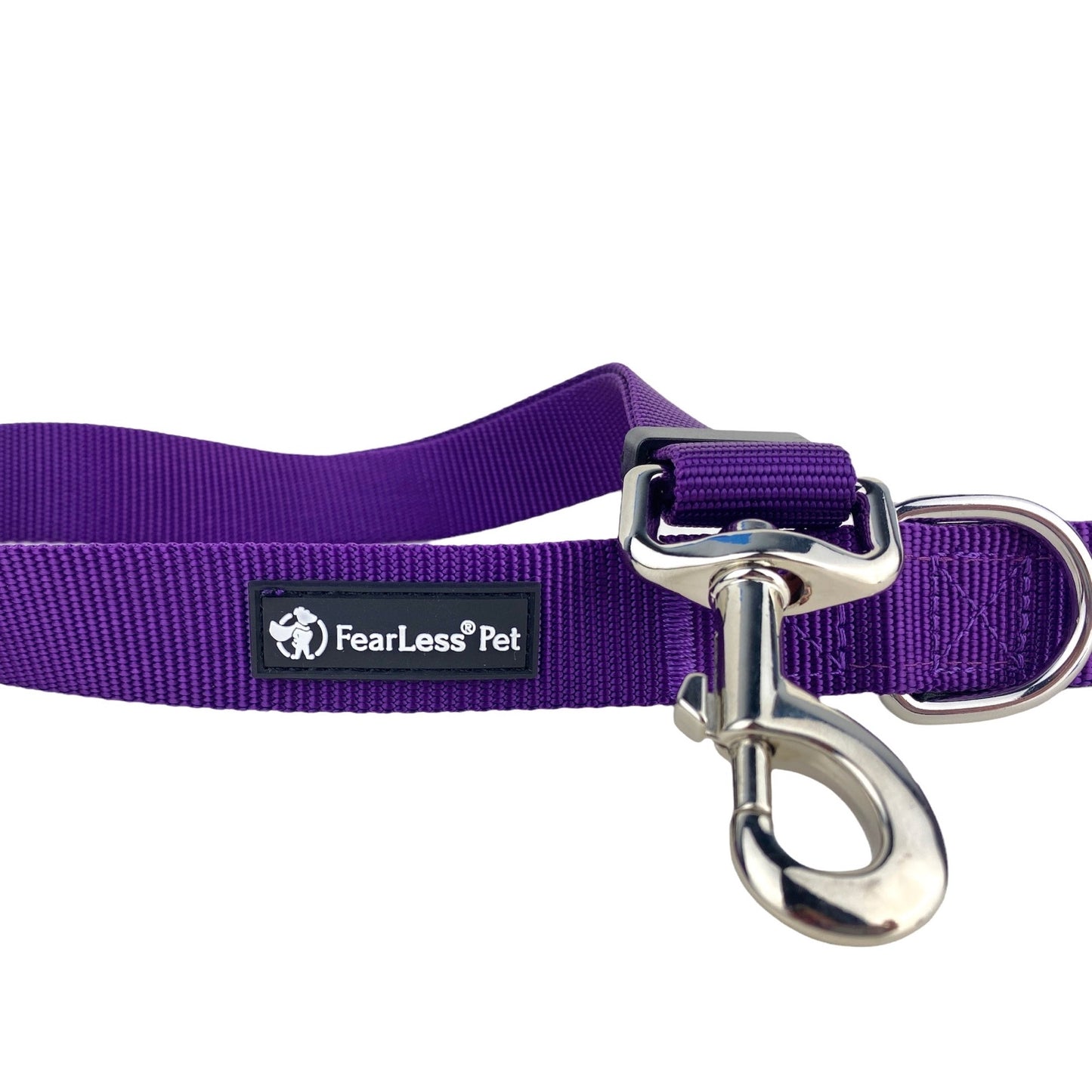 a close up photo of a heavy duty leash snap hook on a purple leash from fearless pet