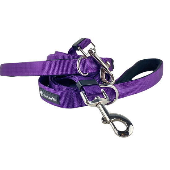 a photo of an adjustable purple leash with a padded handle