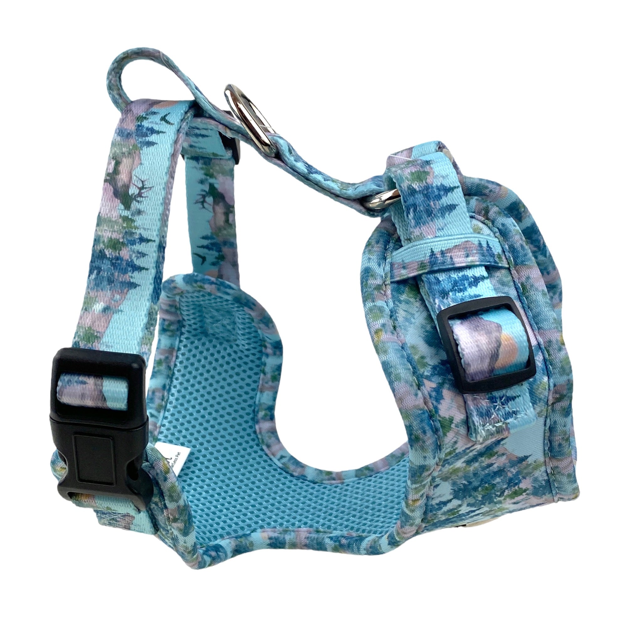 a 3d photo of an adjustable dog harness in a light blue mountain  print from fearless pet