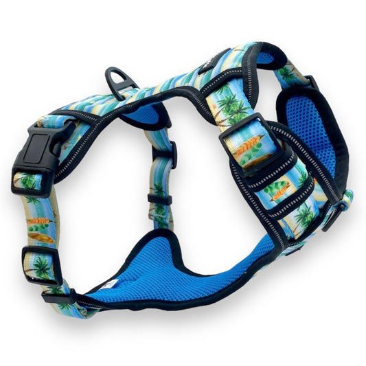 a 3D image of a no pull dog harness in a beach theme print from fearless pet