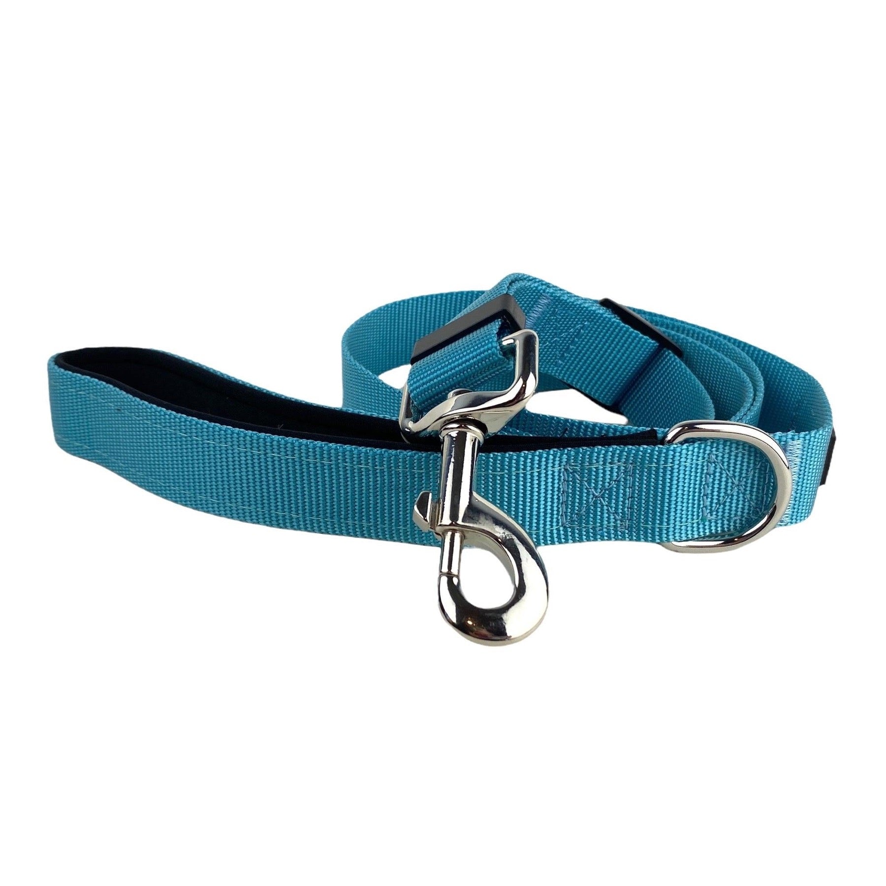 photo of a teal blue adjustable dog leash with a padded handle. Leash is rolled and showing snap hook at end. 